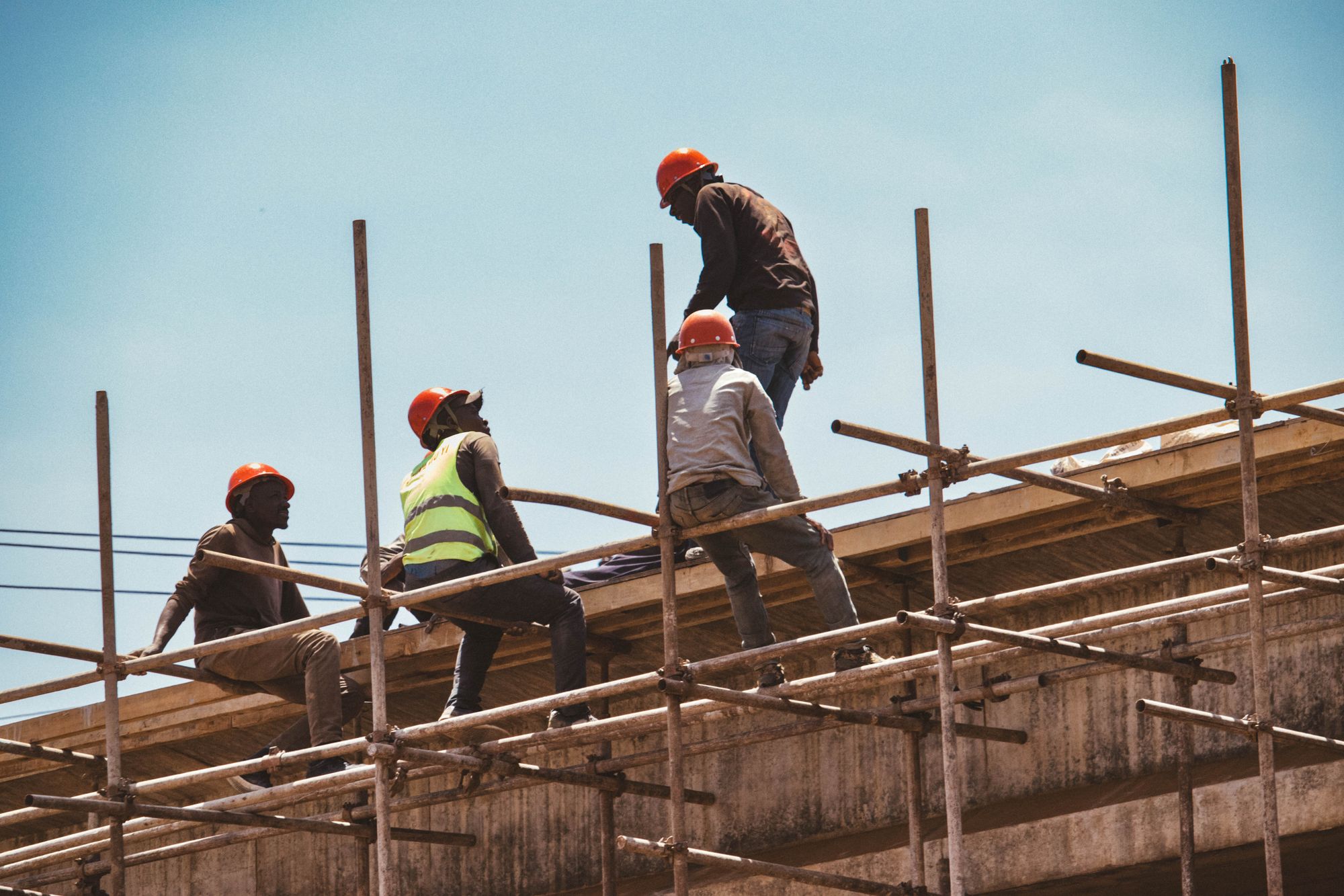 Construction workers on scaffolding in Nairobi, Kenya